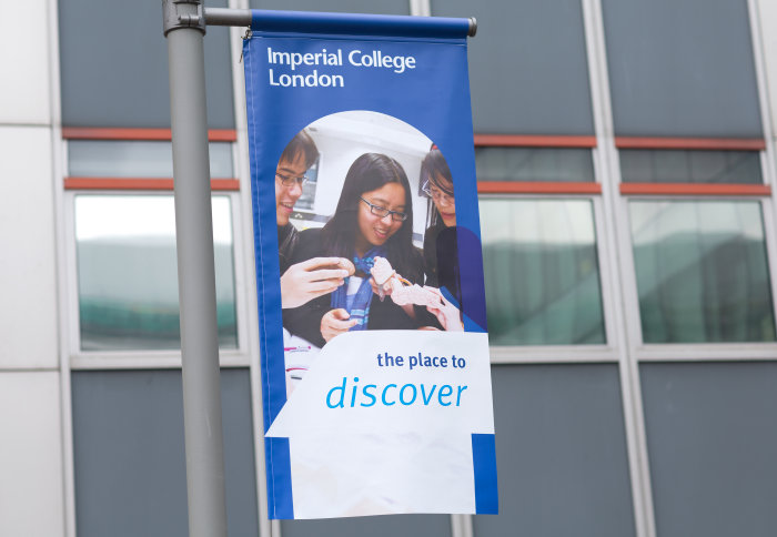 Imperial College banner hanging from lamp post