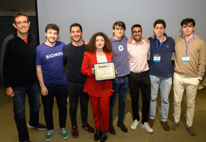 Student awardees hold their certificate