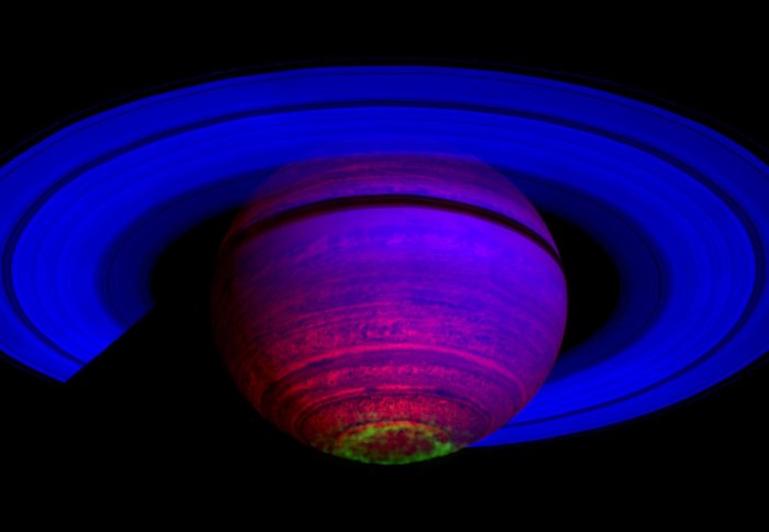 False-colour image of Saturn with a bright green ring around the south pole
