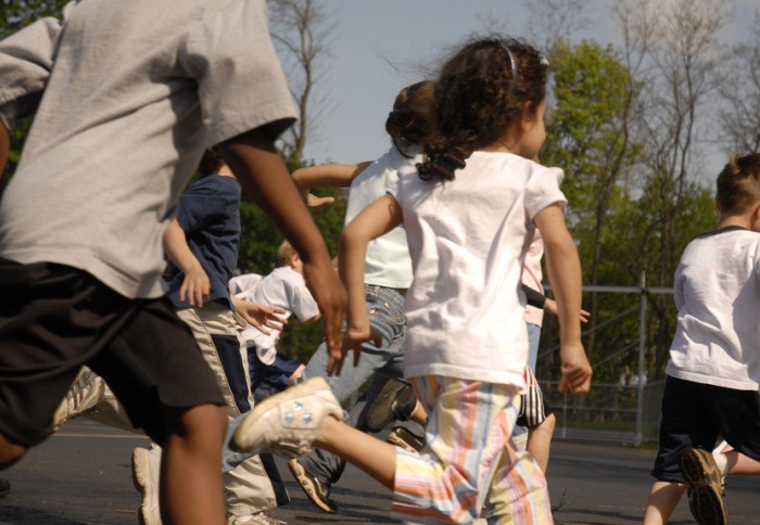 School children running