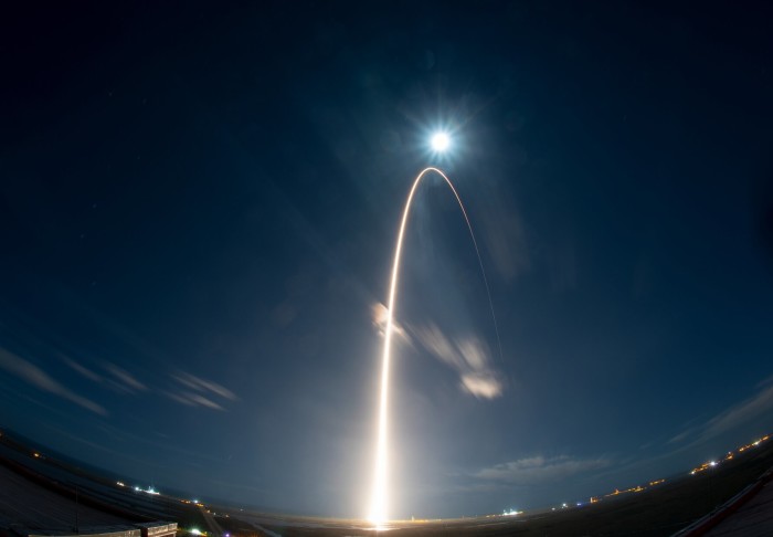 Photo of a rocket launching at night