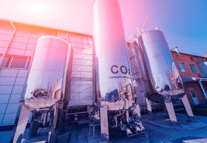 Image of three large carbon dioxide tanks