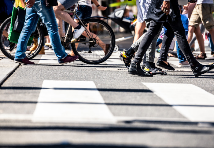 People walking and cycling on road