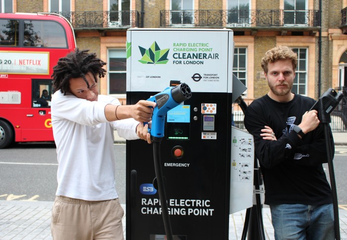 Eliot Makabu and Patrick Reich, co-founders of Bonnet, pose near an Electric Vehicle charging point