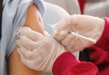 COVID-19 vaccination cuts infection risk by half in school-aged children - REACT