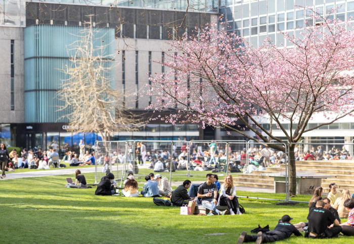 Imperial students and staff members gathering at Dangoor Plaza in the College's South Kensington campus.