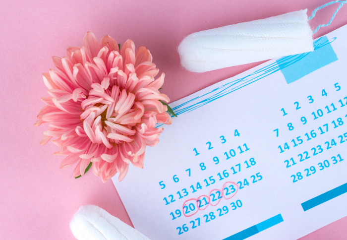 Tampons on menstruation period calendar