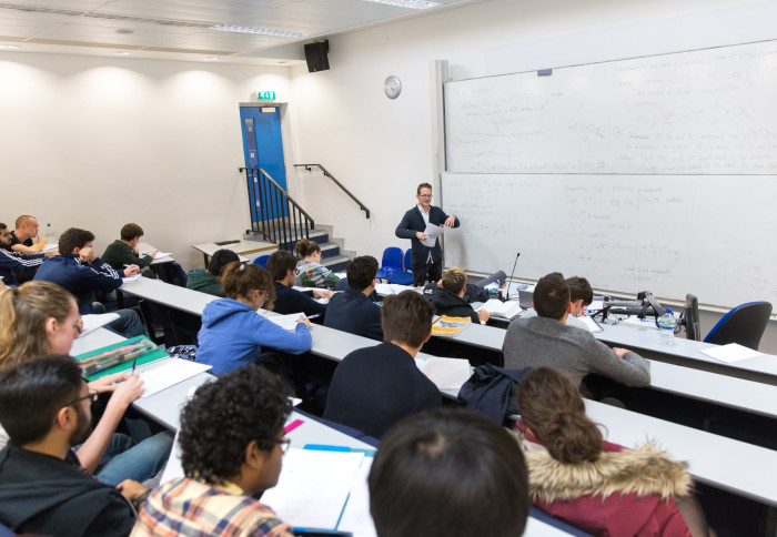 Students in Professor Gustav Holzegel's Pure Mathematics class.