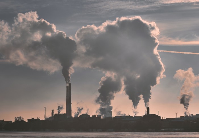 Smoke coming out of factory chimneys