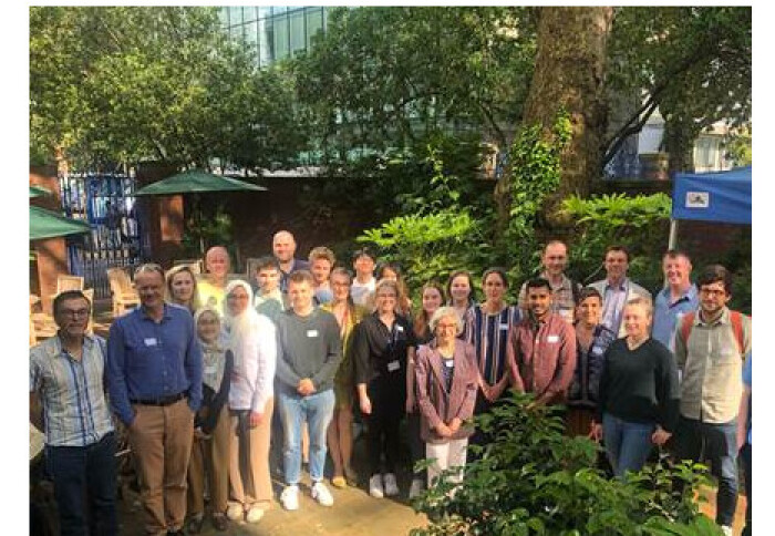 Summer Meetng 2023 - delegates standing in the garden at 170 Queen's Gate, South Kensington Campus.