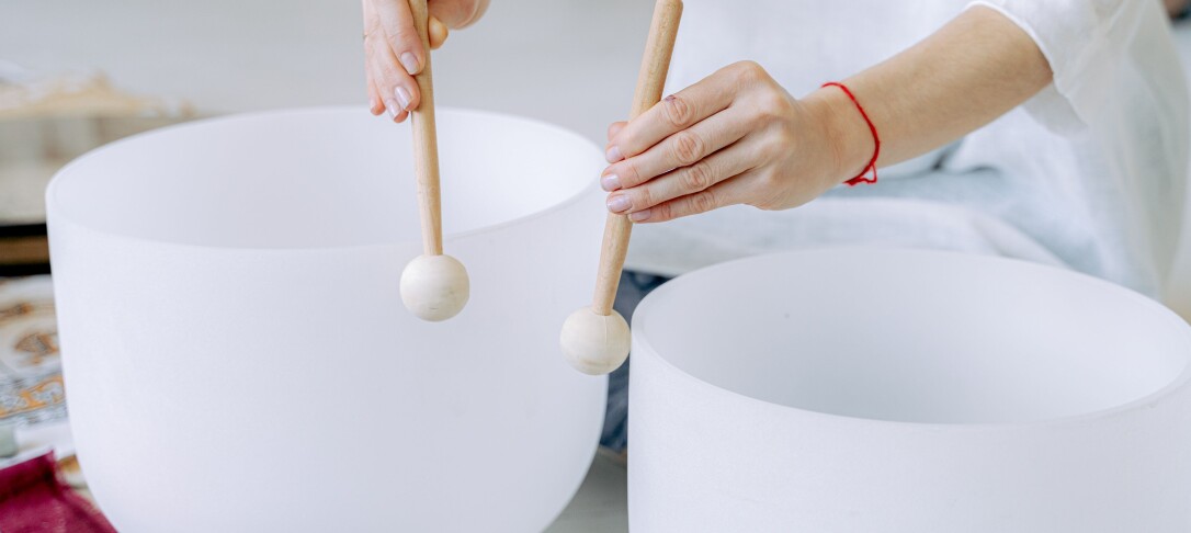 stick hitting crystal bowl