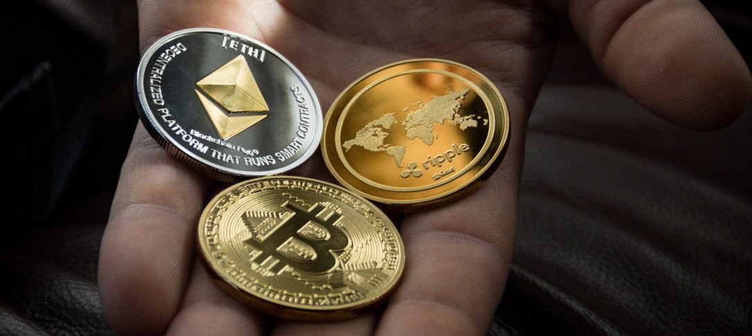 Image of coins in a man's hand