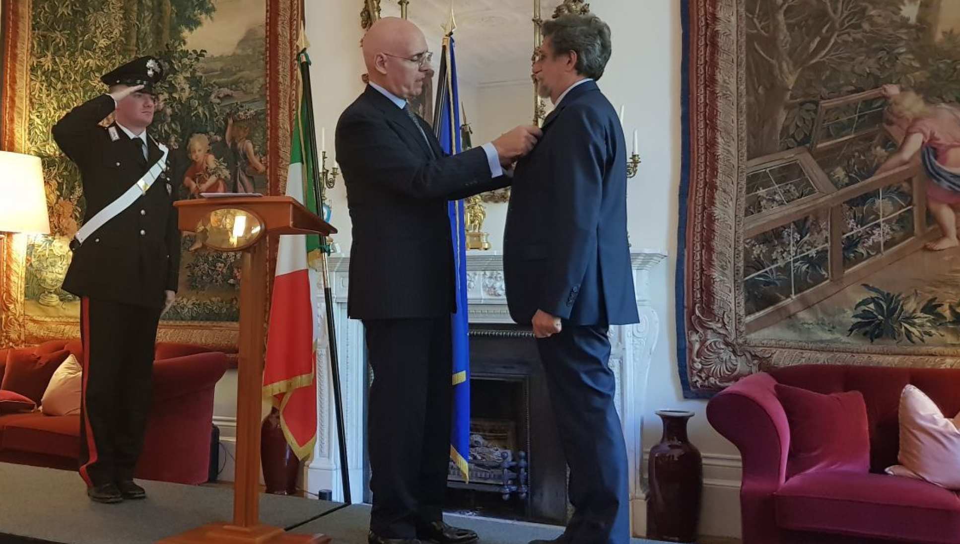 Professor Paolo Vineis receiving his honour from the Italian Ambassador