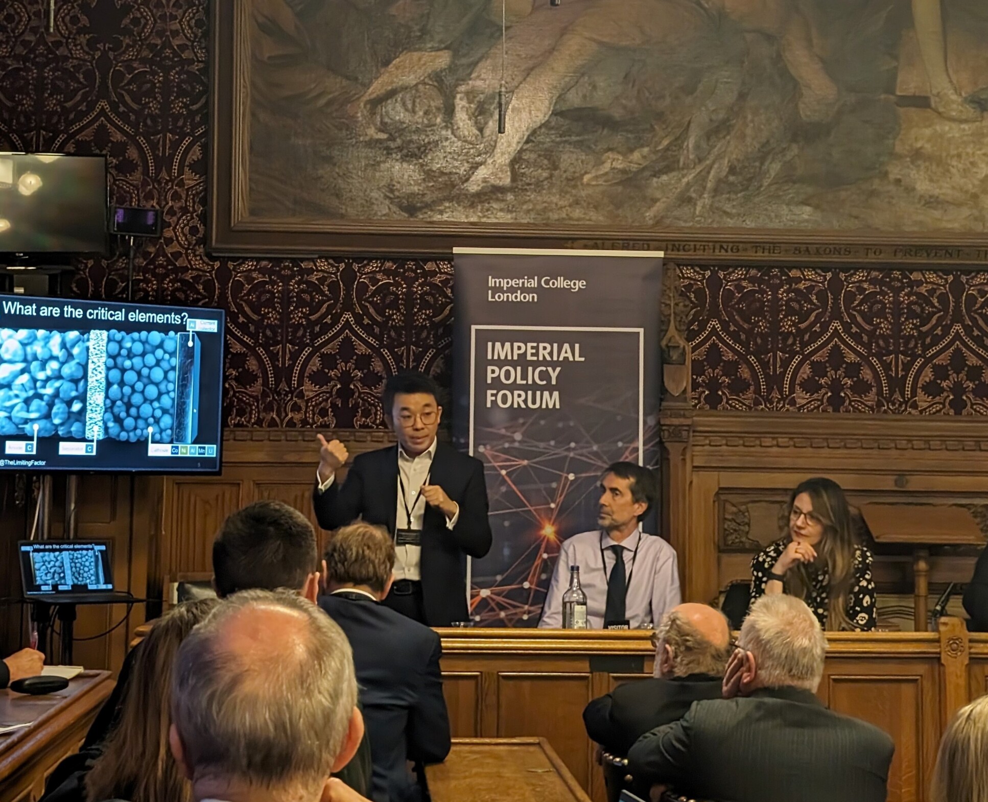 Dr Billy Wu gives presentation on challenges in battery research to audience in parliament