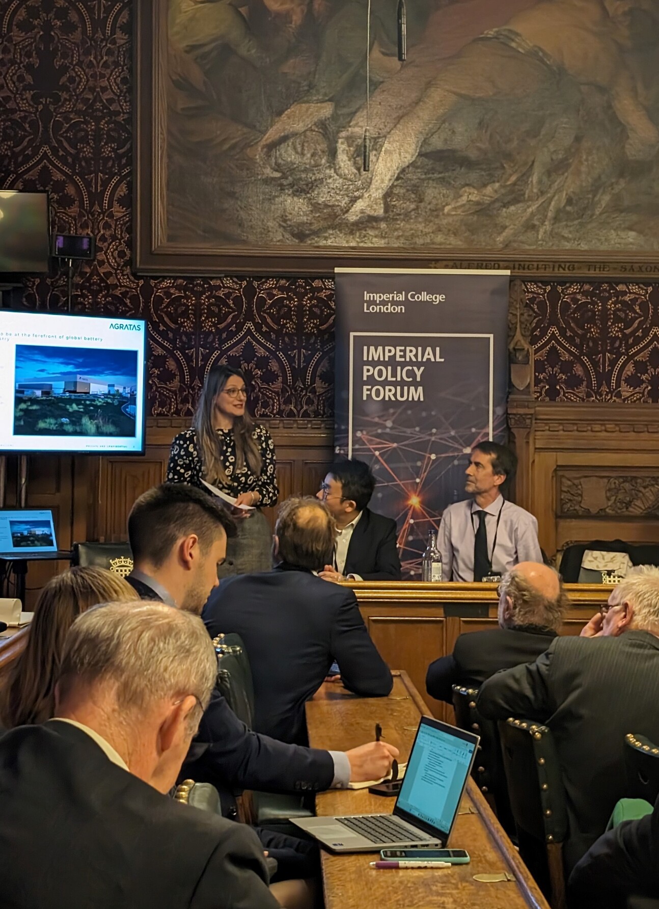Dr Valentina Gentili delivering her presentation in front of an audience in parliament