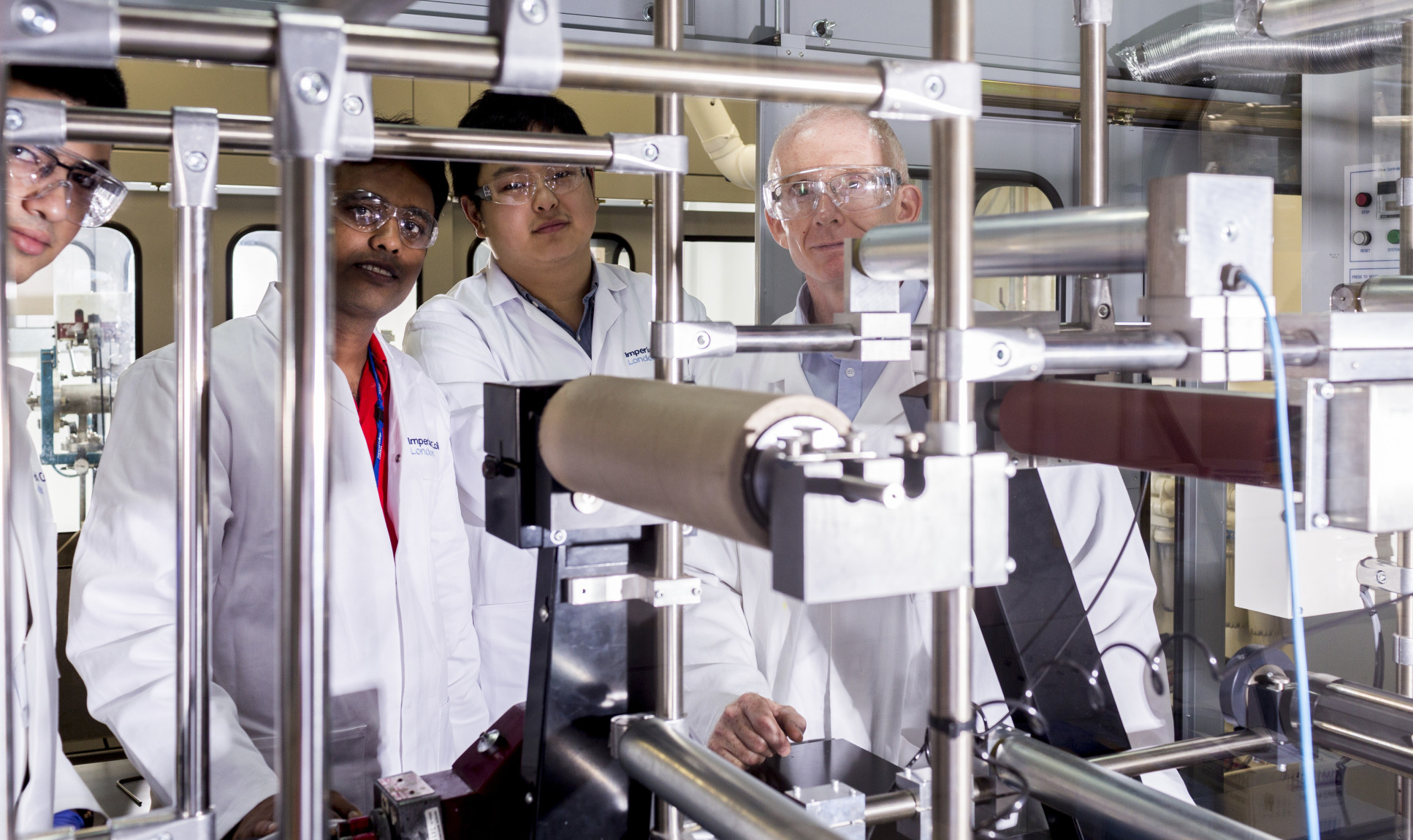 Professor Andrew Livingston and colleagues in his lab at Imperial