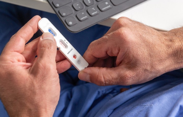 A PCR test held in hands