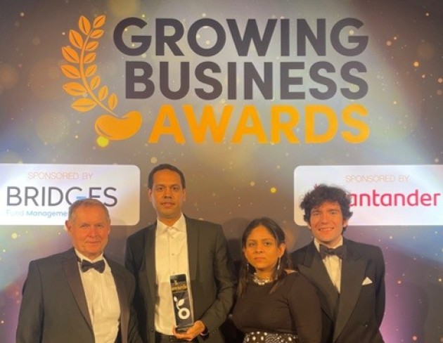 S-Cube team receiving award at Growing Business Awards 2021