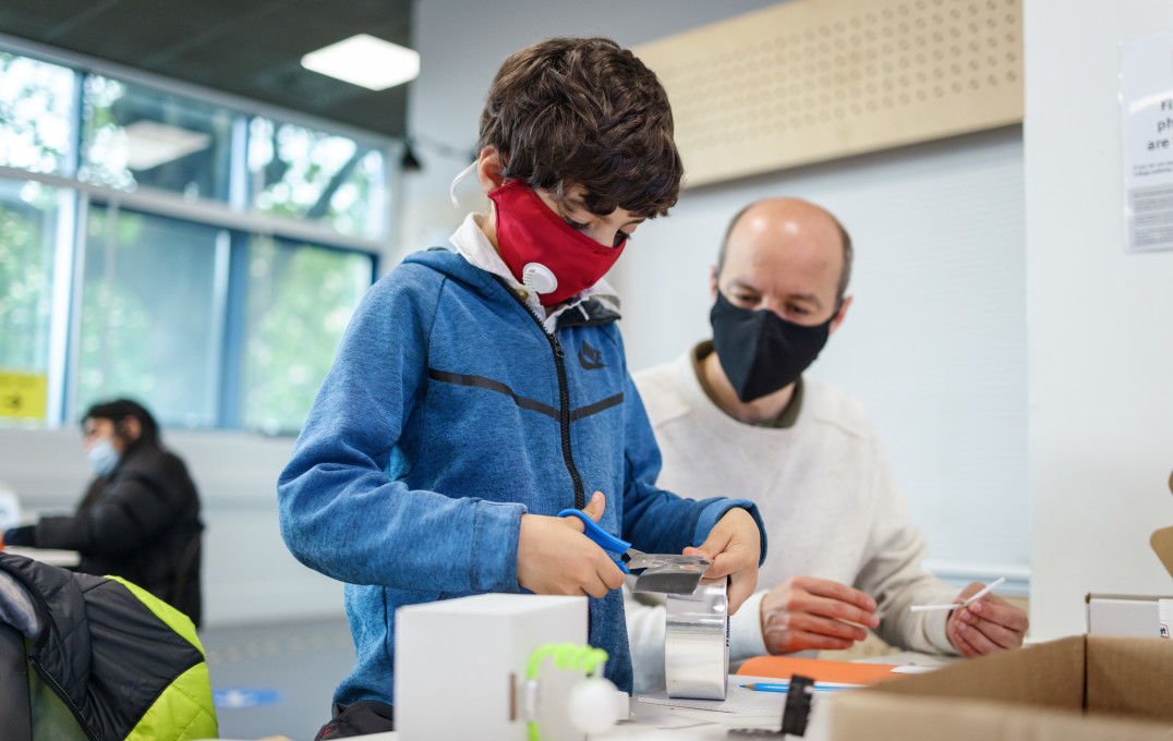 Man and a boy doing an activity