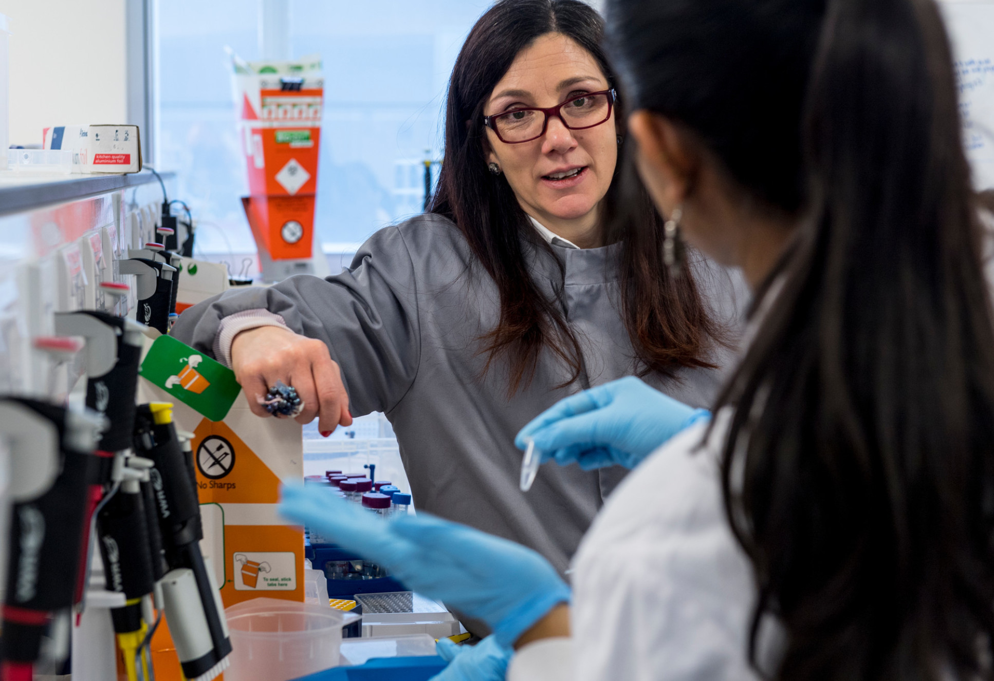 Astrazeneca staff member visiting students at Imperial College London Labs at Hammersmith Hospital