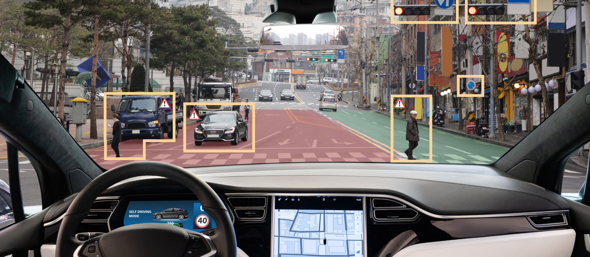 Photo from inside a driverless car looking out of the windscreen. Objects in the distance are highlighted