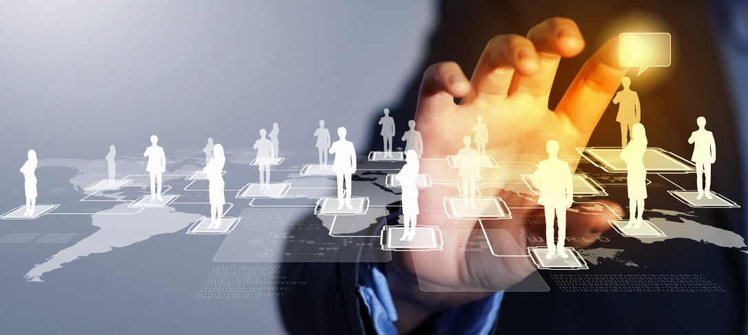 Image of hand touching virtual icon of social network