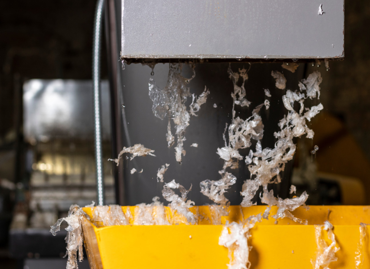 Plastic film going down a chute