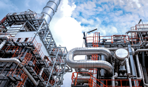 Close up Industrial view at oil refinery plant form industry zone with sunrise and cloudy sky 