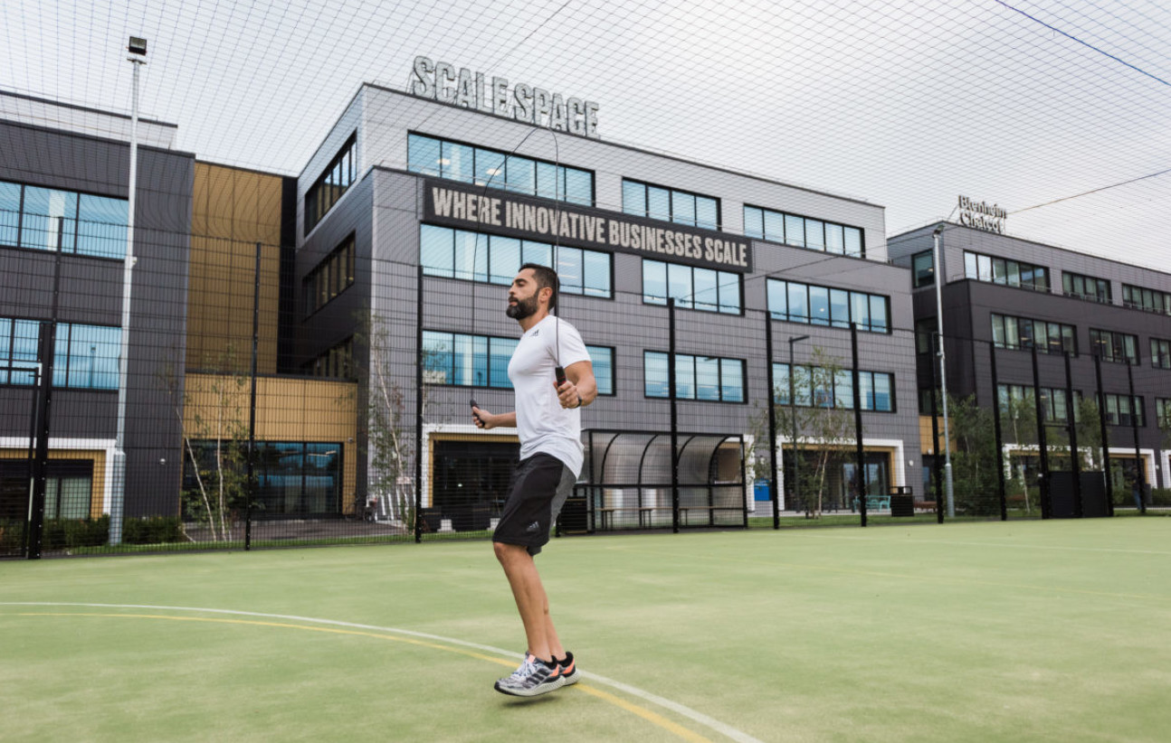 A man exercising in the sports area outside Scale Space