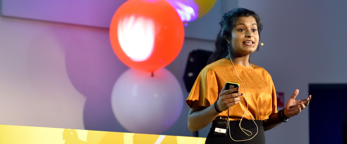 A student presenting at the We Innovate finals