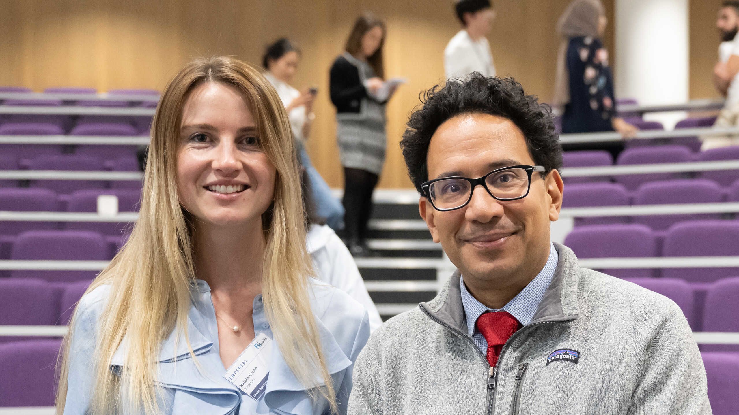Aldo Faisal and Natalie Cooke in a lecture theatre