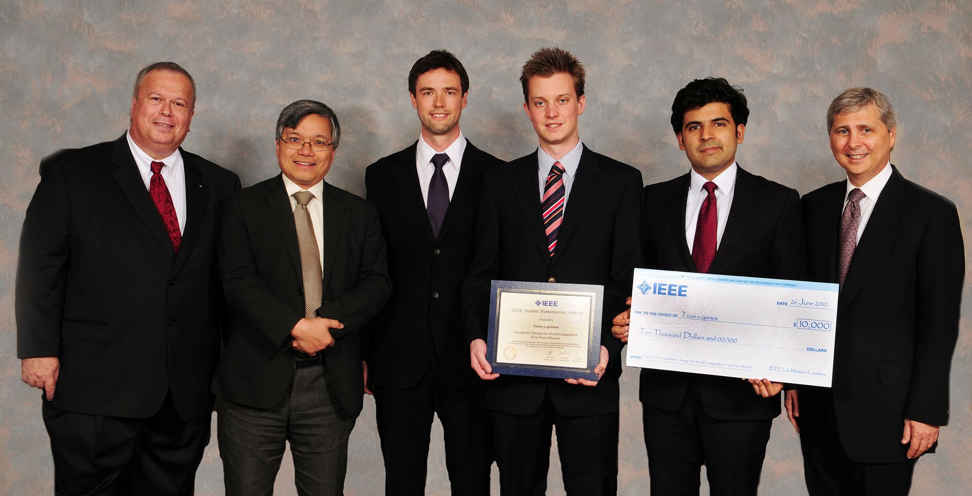 Equinox receiving the IEEE President's Change the World Award 2010