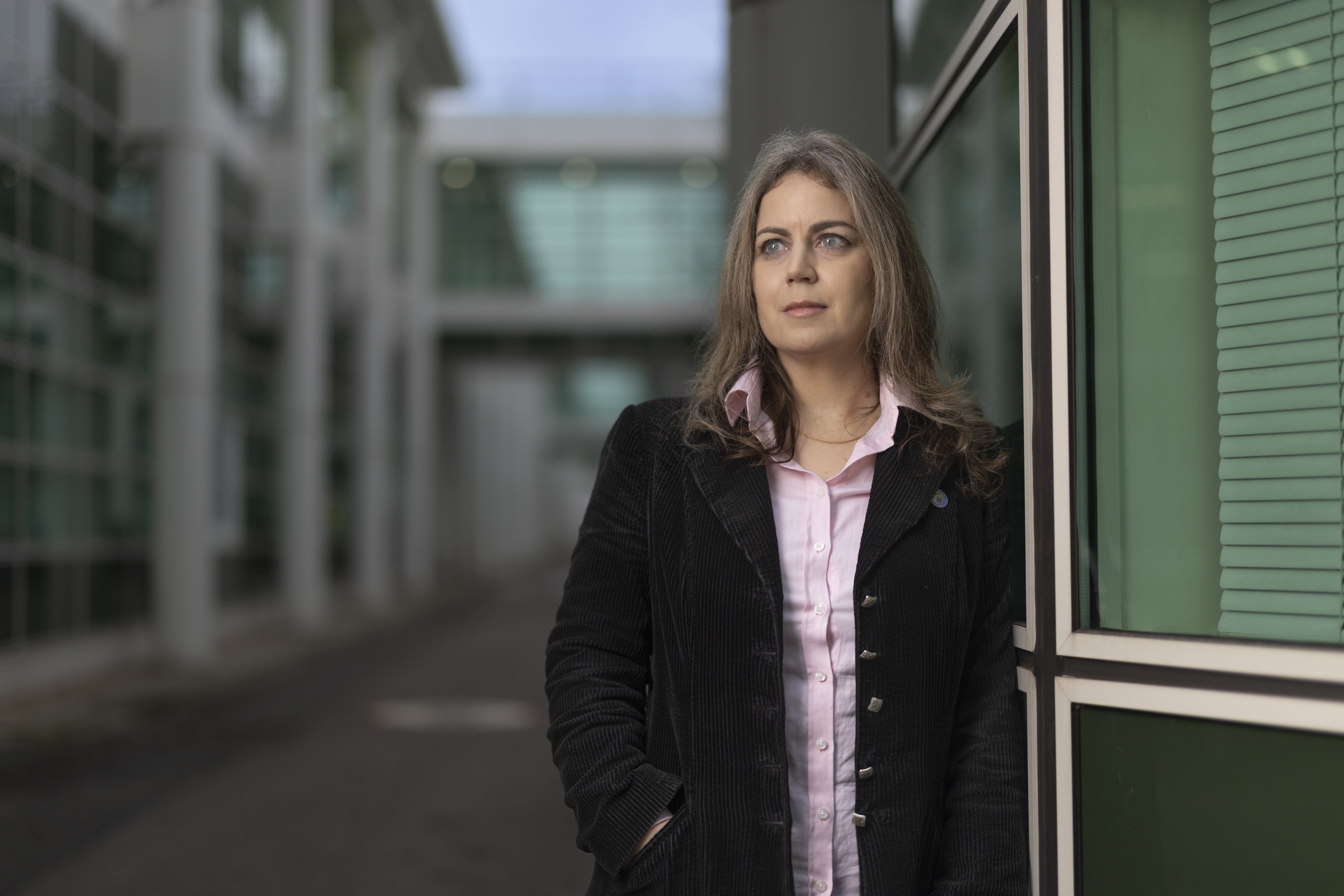 Ibolya Kepiro stood outside wearing a jacket and pink shirt
