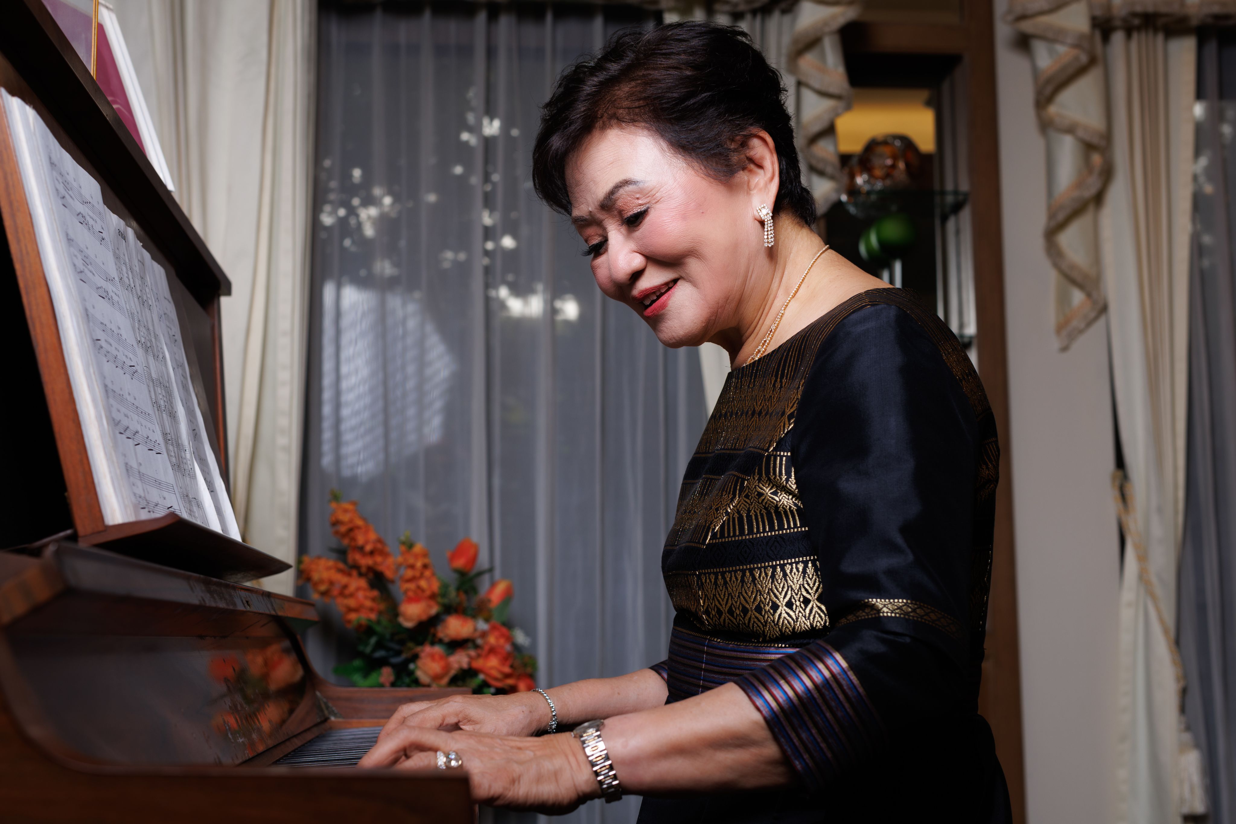 Kalaya Sophonpanich sat at her piano