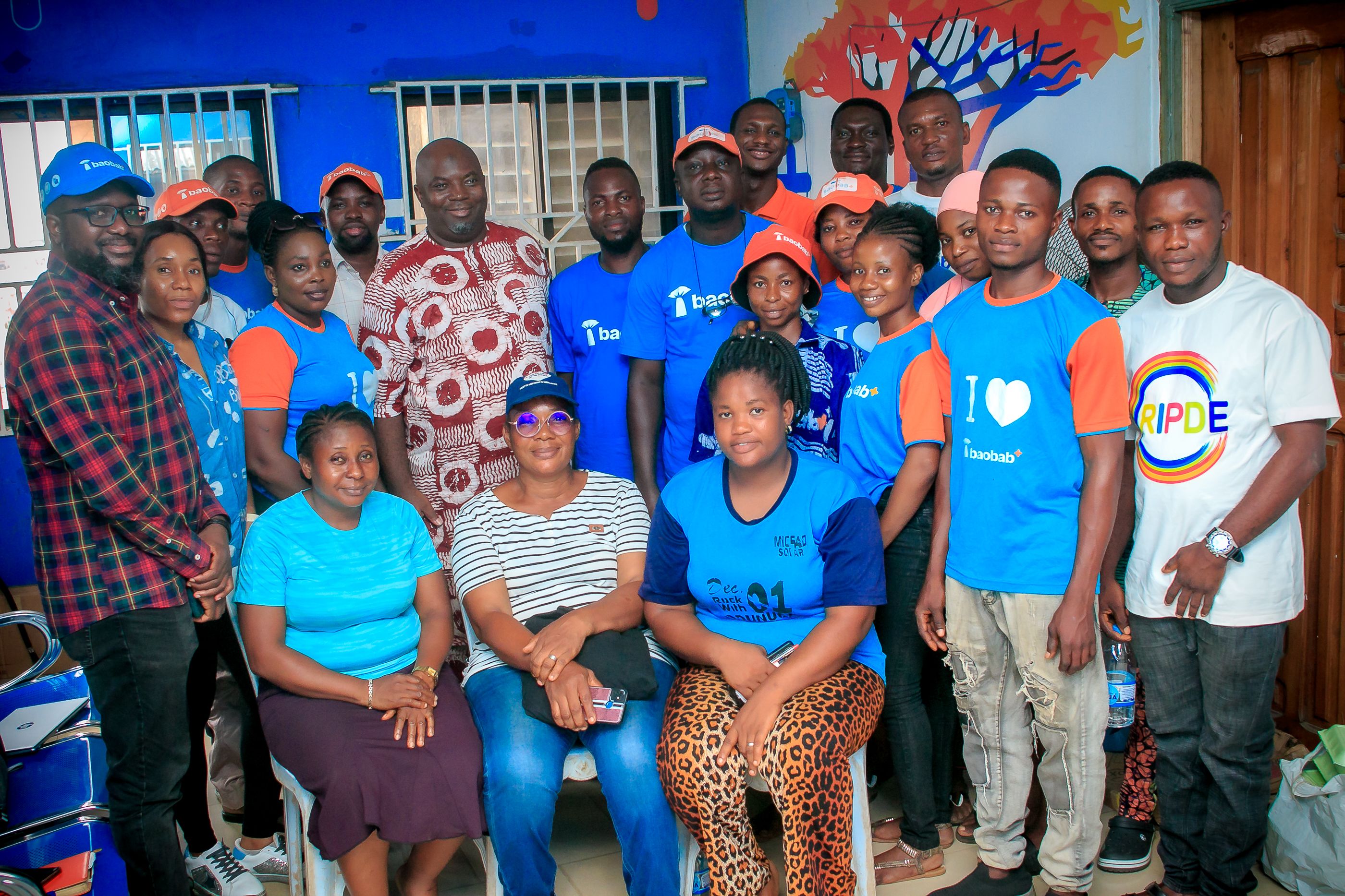 A group photo of Kolawole and some of the Izili team