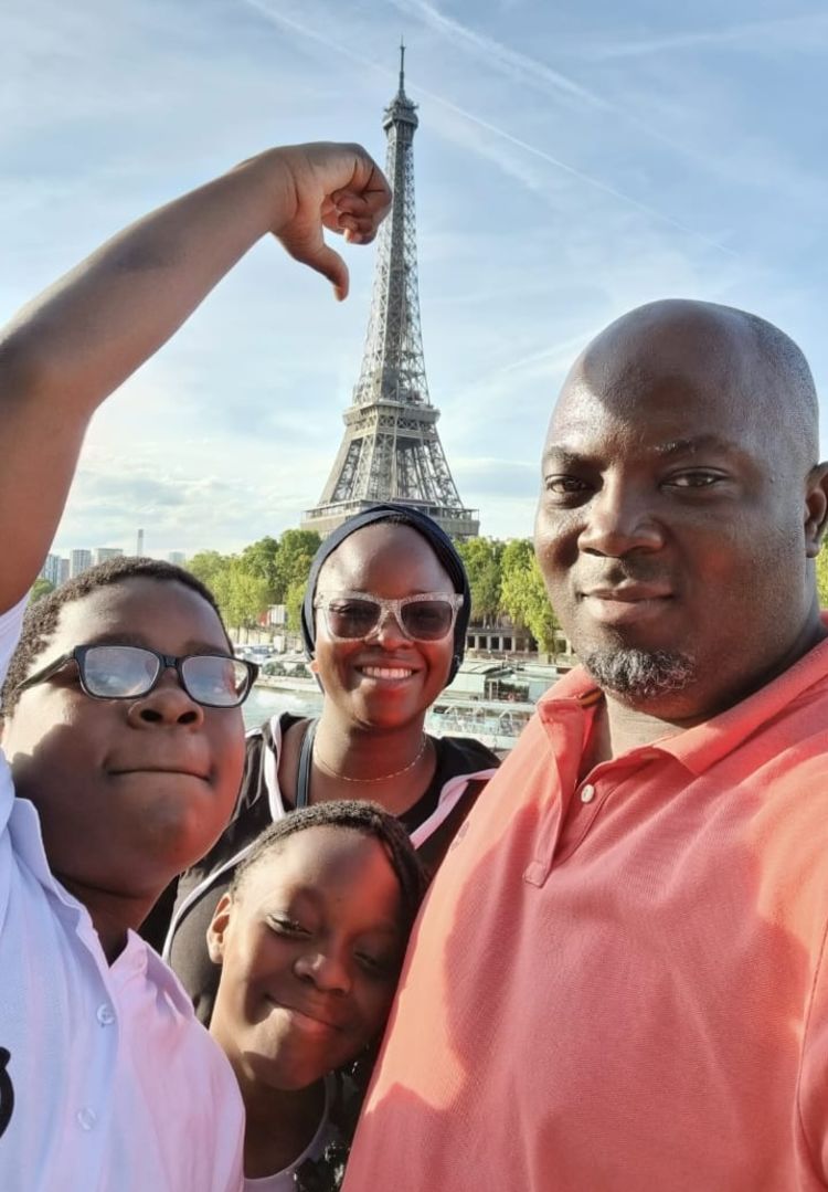 Kolawole and his family in Paris