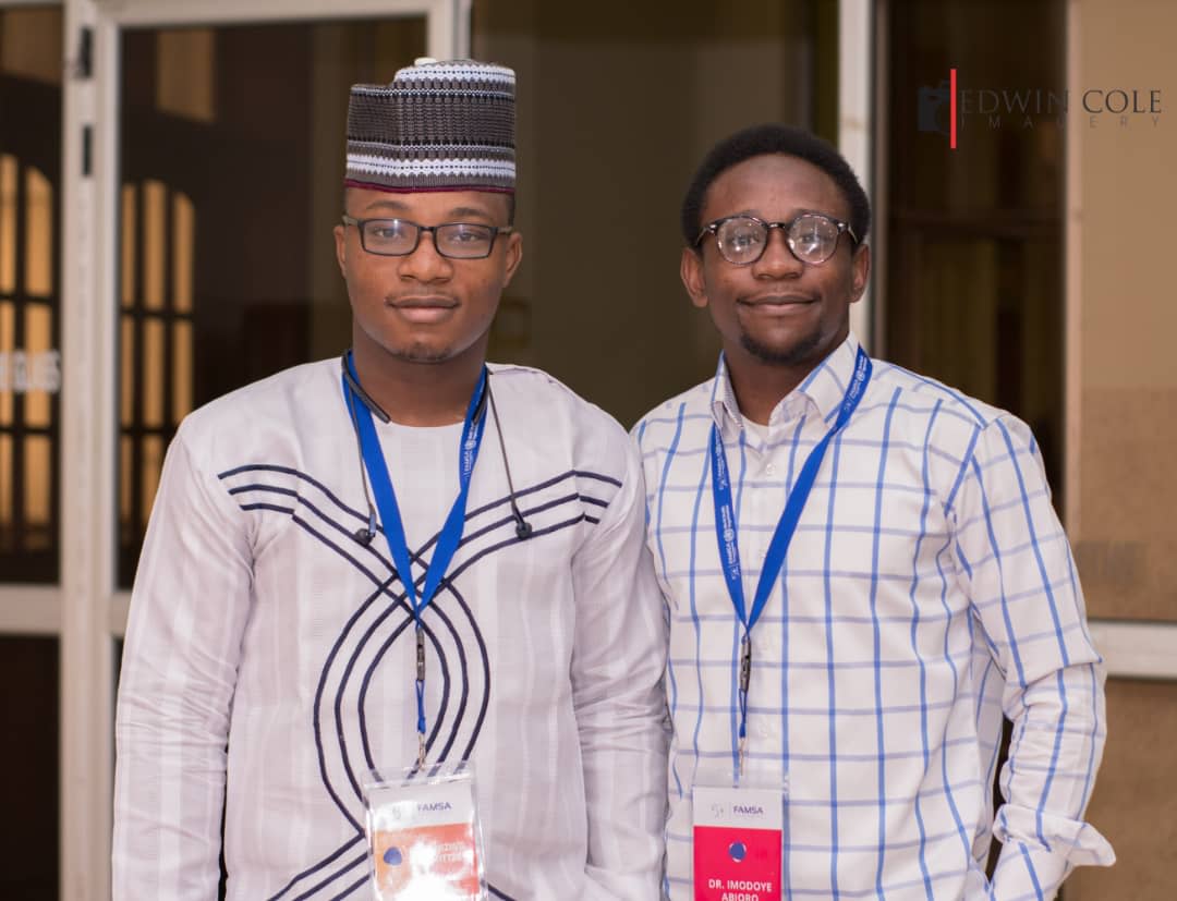 Tunde stood with Dr Imodoye Abioro