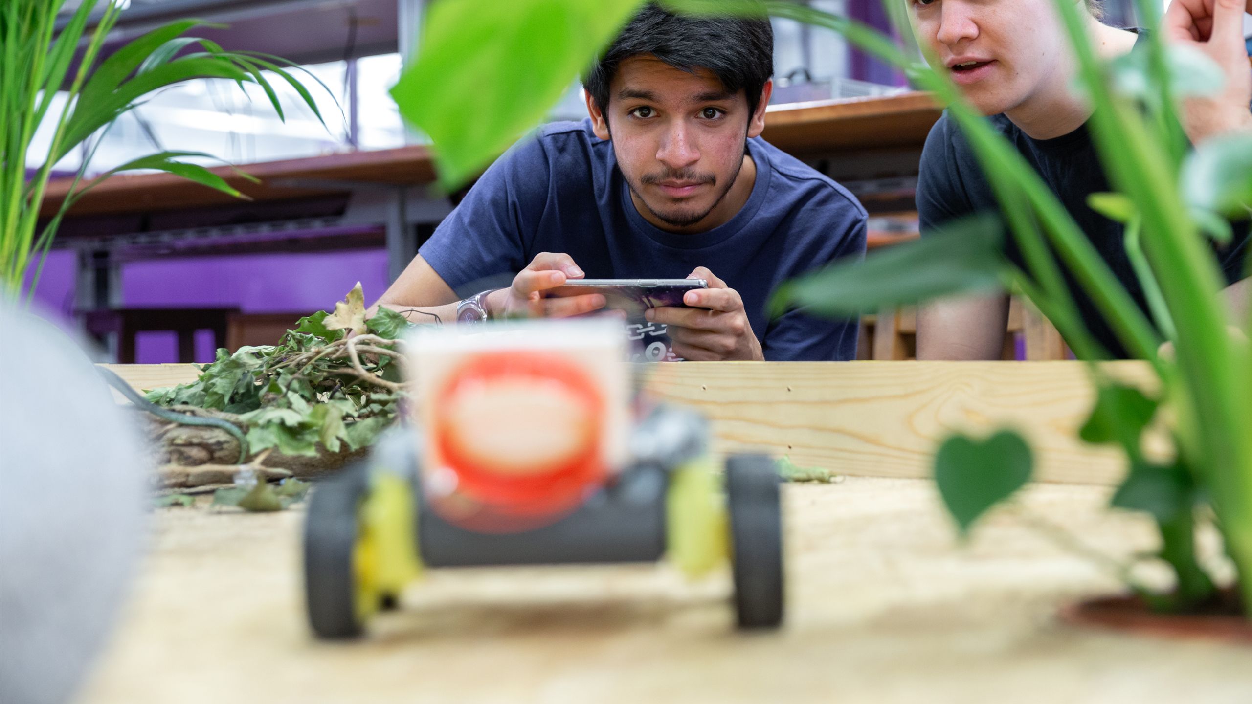 Student with phone-controlled rover