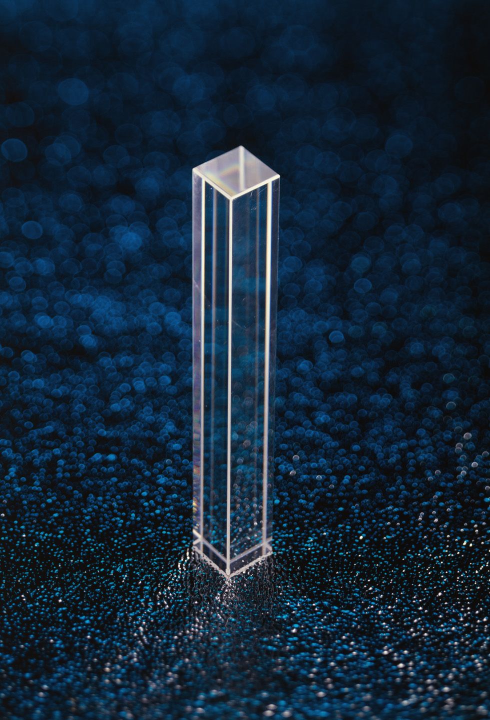 A small, thin block that looks like glass.