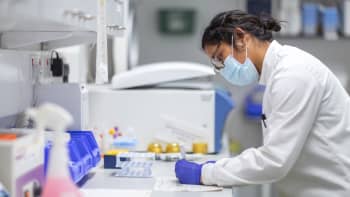 A female researcher working in a laboratory.