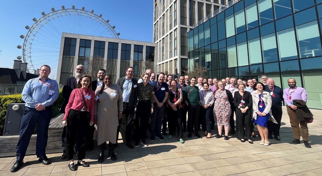 Group photo outside an IBM building