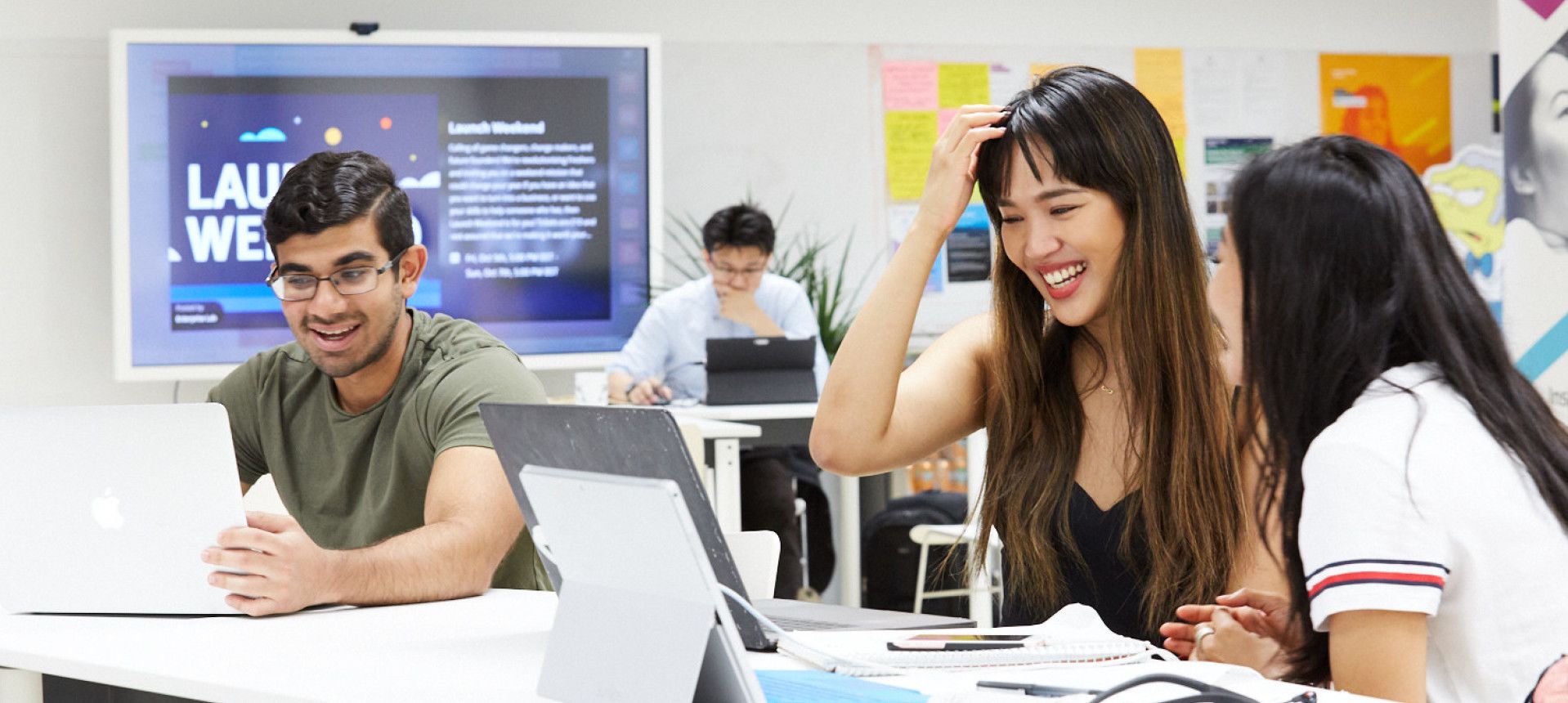 Students using a co-working space in the Enterprise Lab.