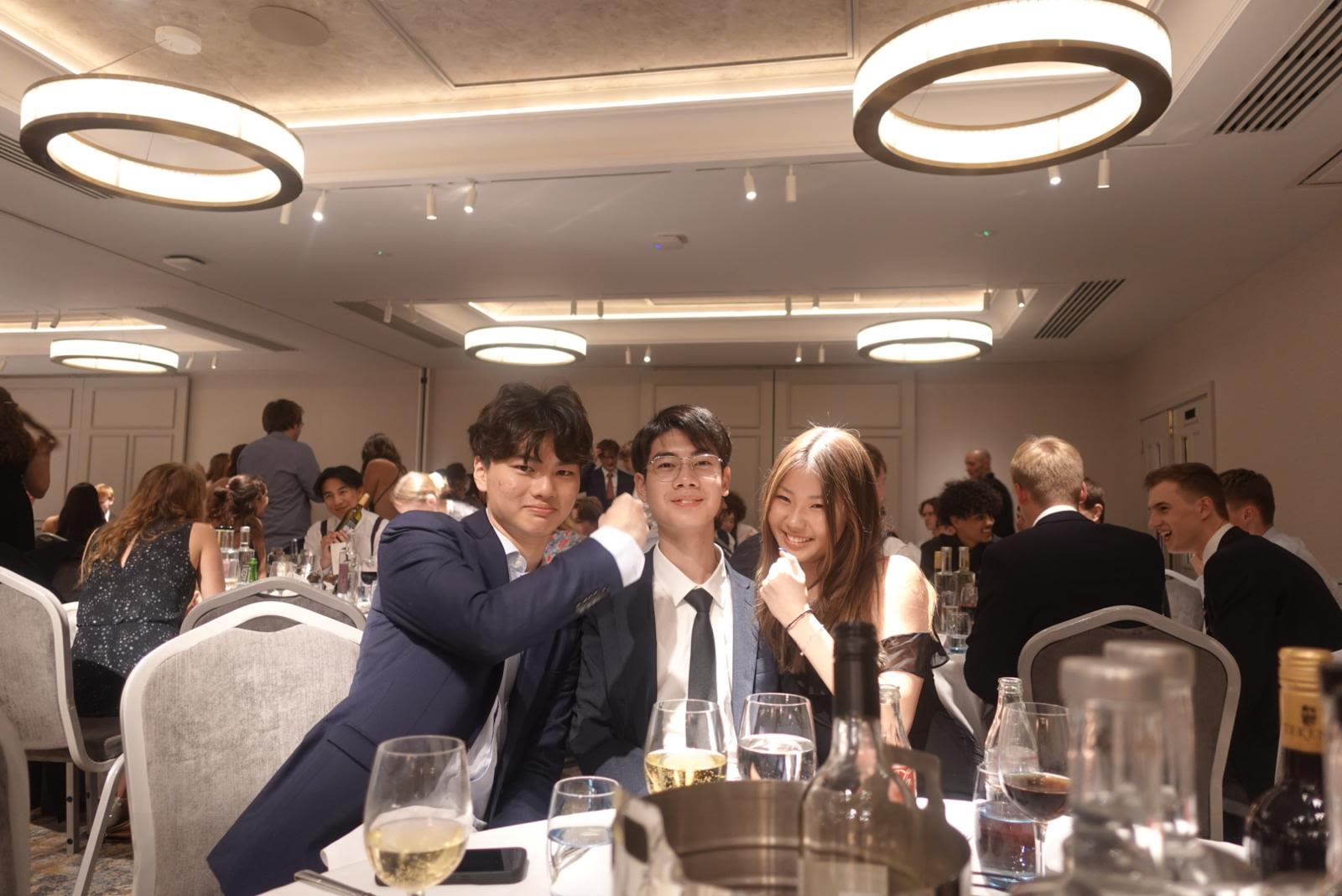 Eloise with friends at a formal dinner