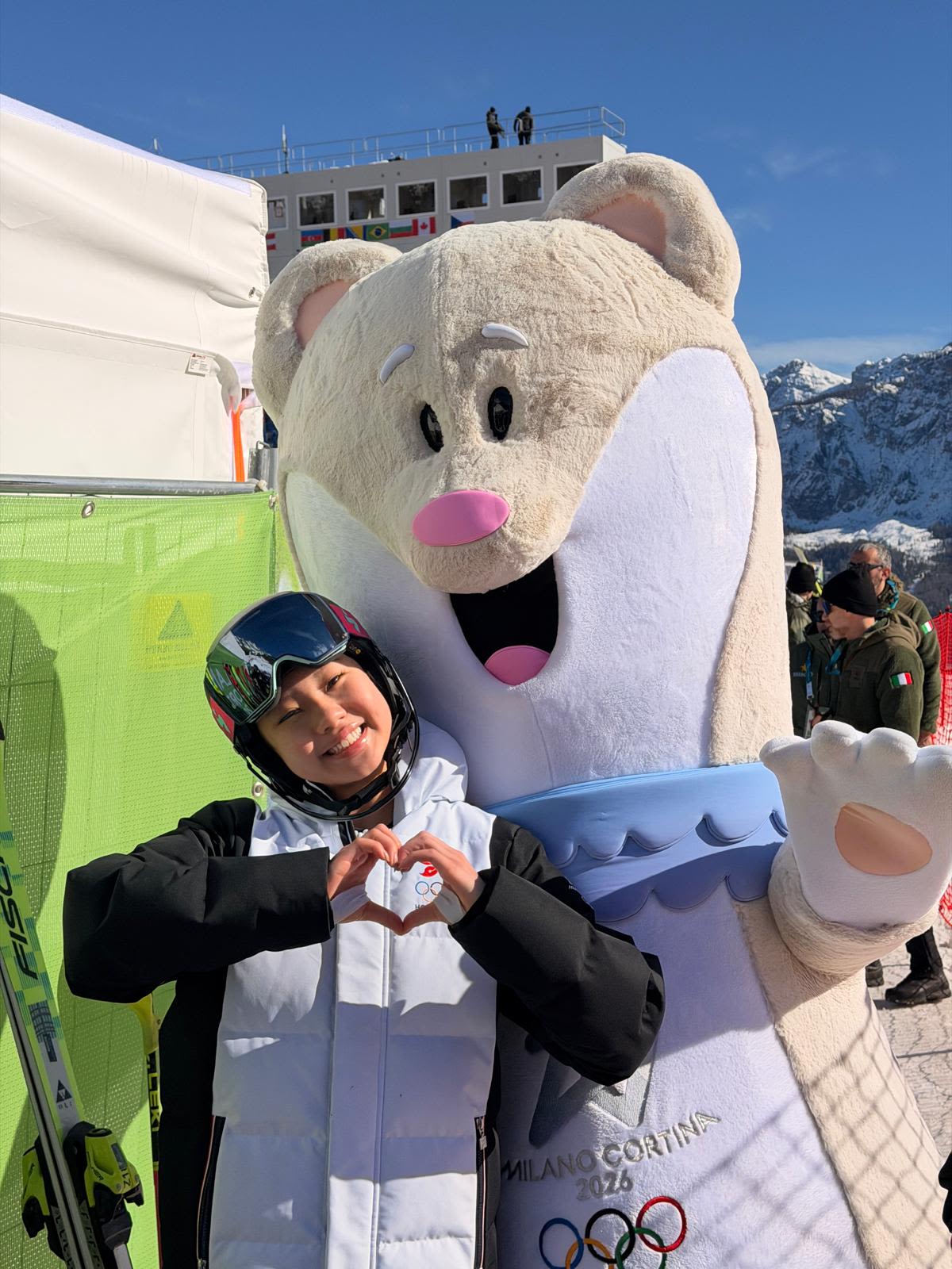 Eloise posing with mascot