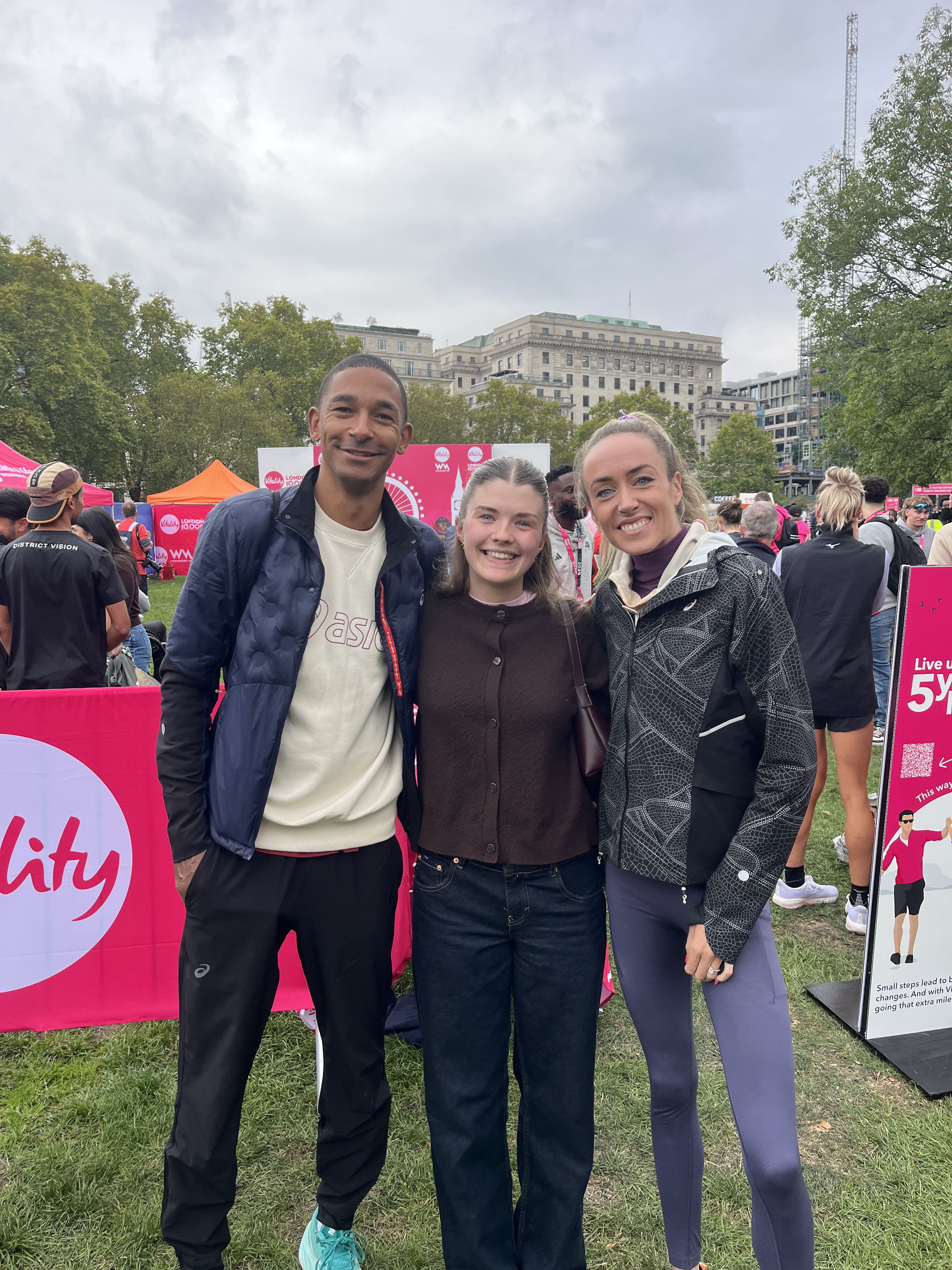 Hannah at an event standing with Team GB Olympic runners Eilish McColgan and Michael Rimmer.