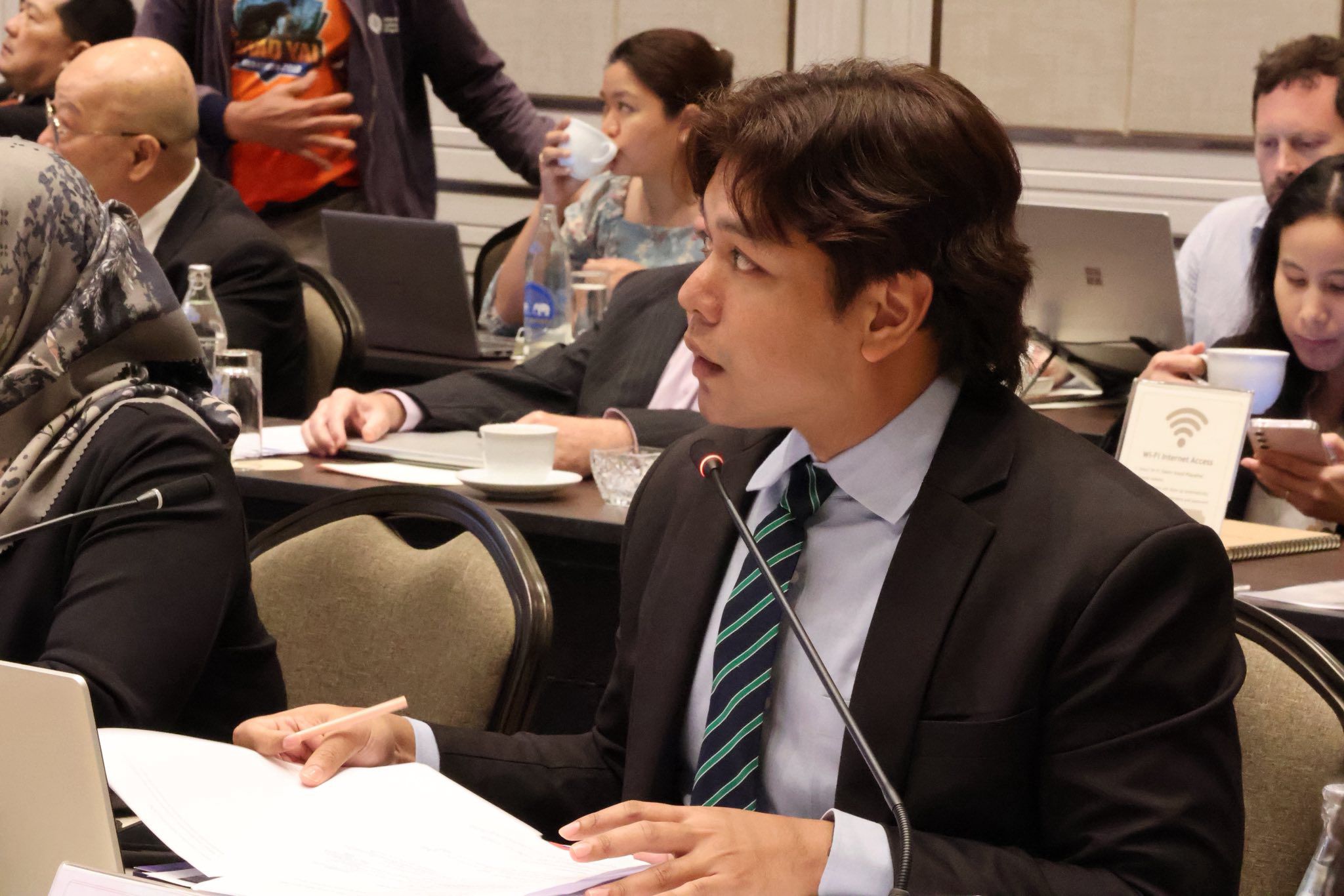 Worapon speaking at an event