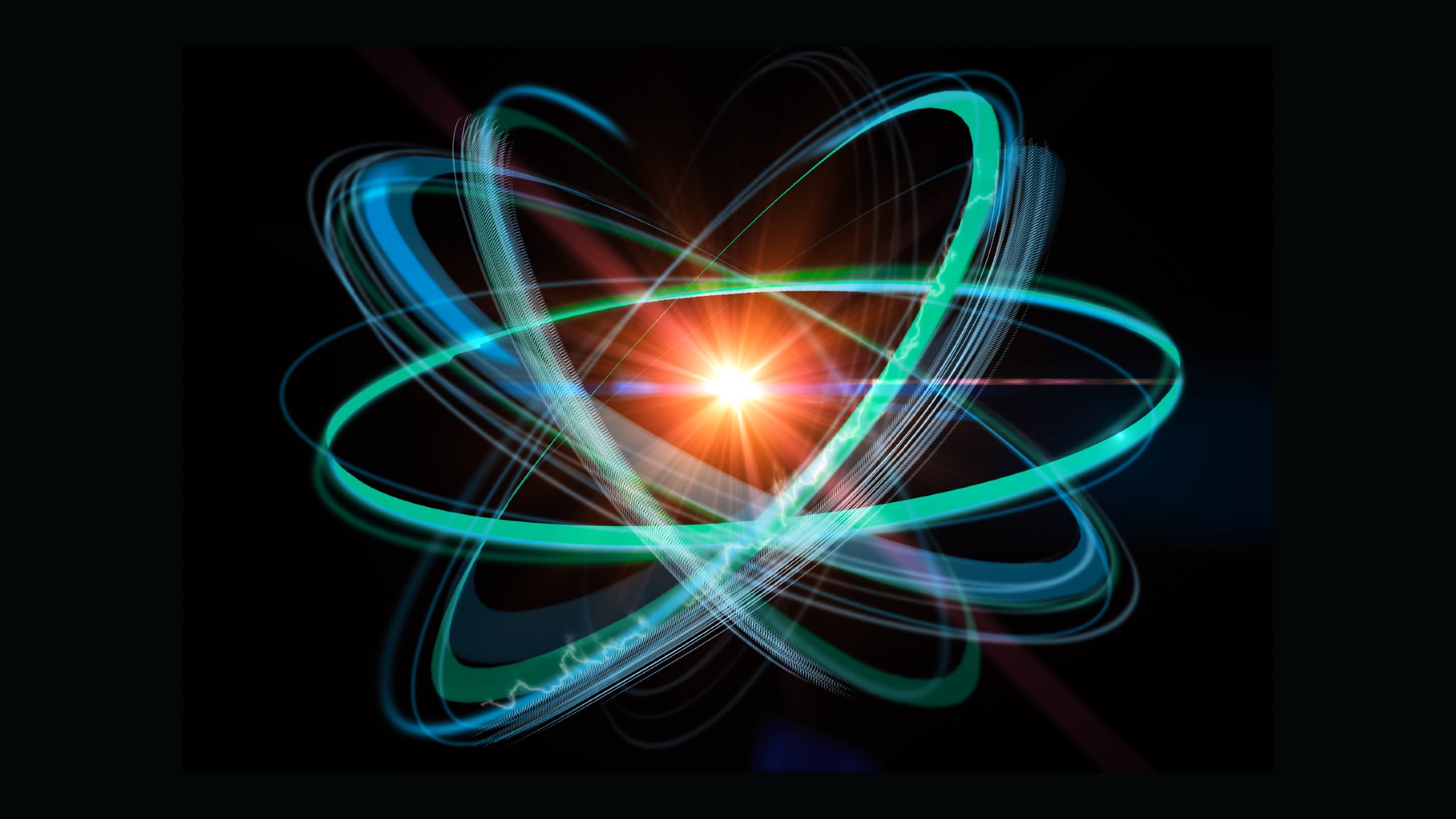 An artistic rendition of an atom, made up of blue and orange energy circulating a nucleus