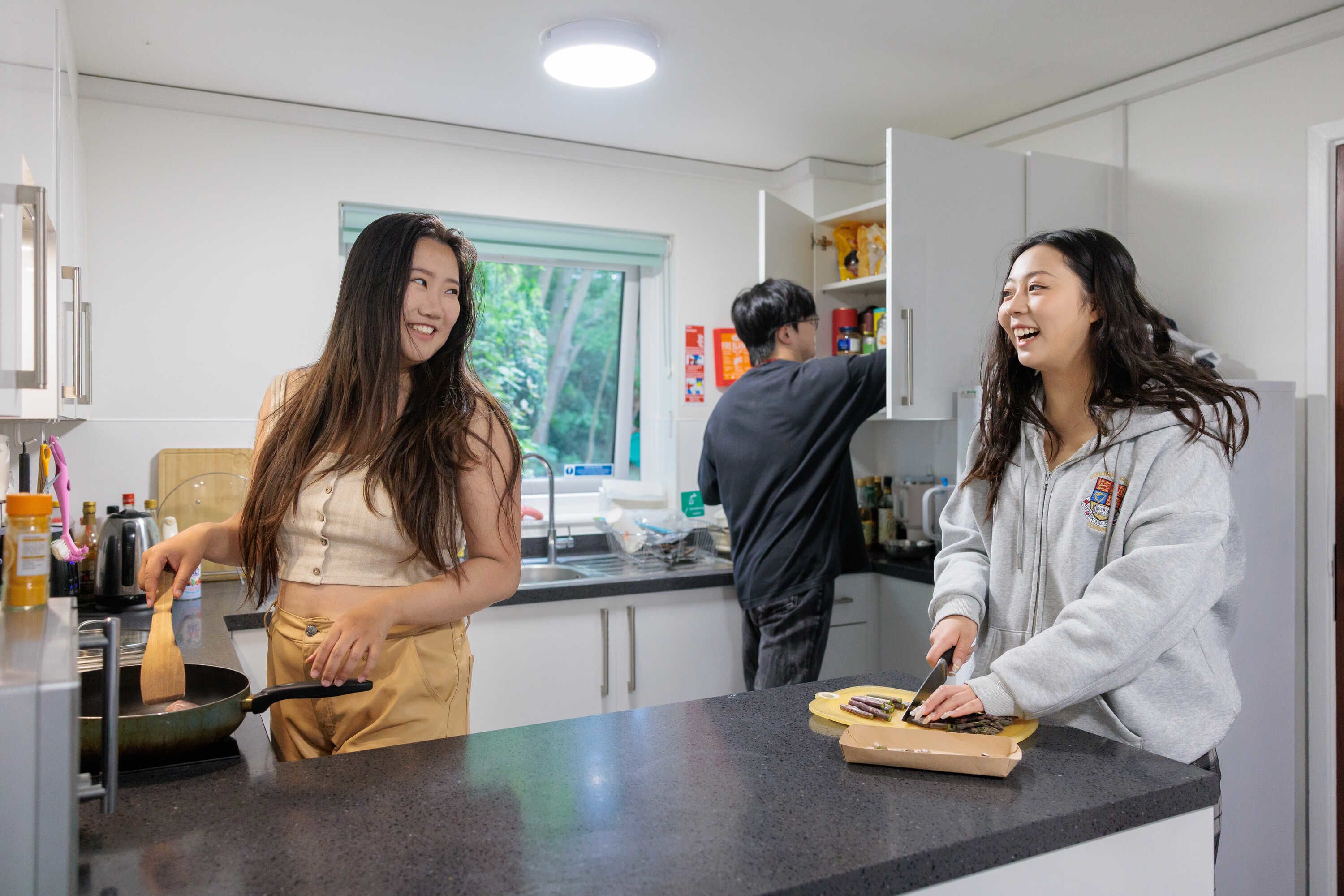 Students preparing food in a kitchen