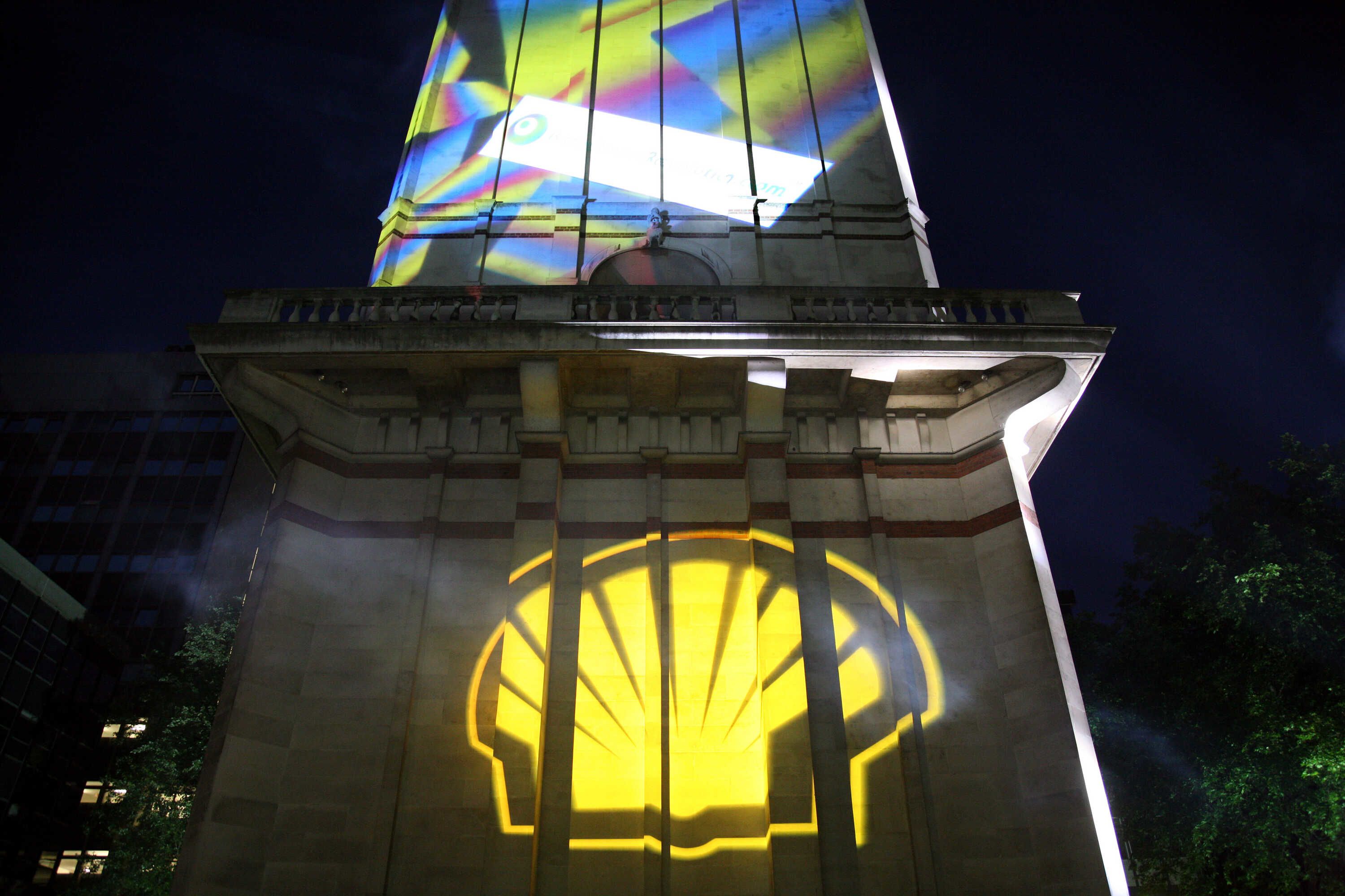 Shell logo projected on Queens tower