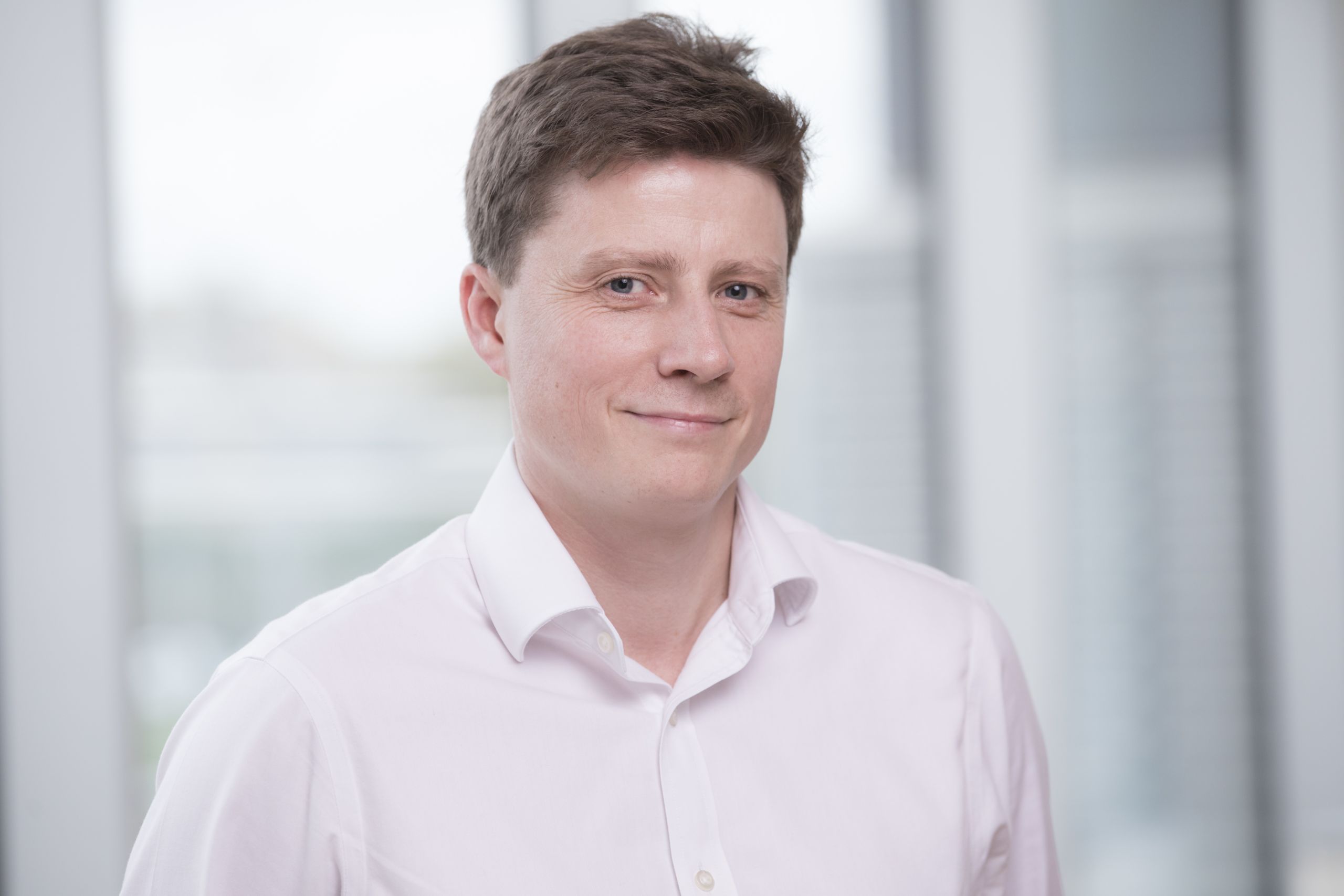 Picture of Dr Ed Mullins, Clinical Lecturer at Imperial and the George Institute for Global Health looking at camera